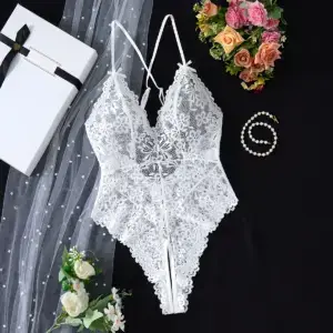 Elegant White Lace Bodysuit - Sexy Lingerie for Women with Crisscross Back Straps 1